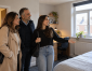 Parents viewing a modern student house with their son before starting university in Ormskirk